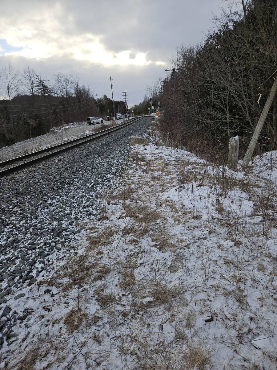 Graded gravel corridor alongside rail track